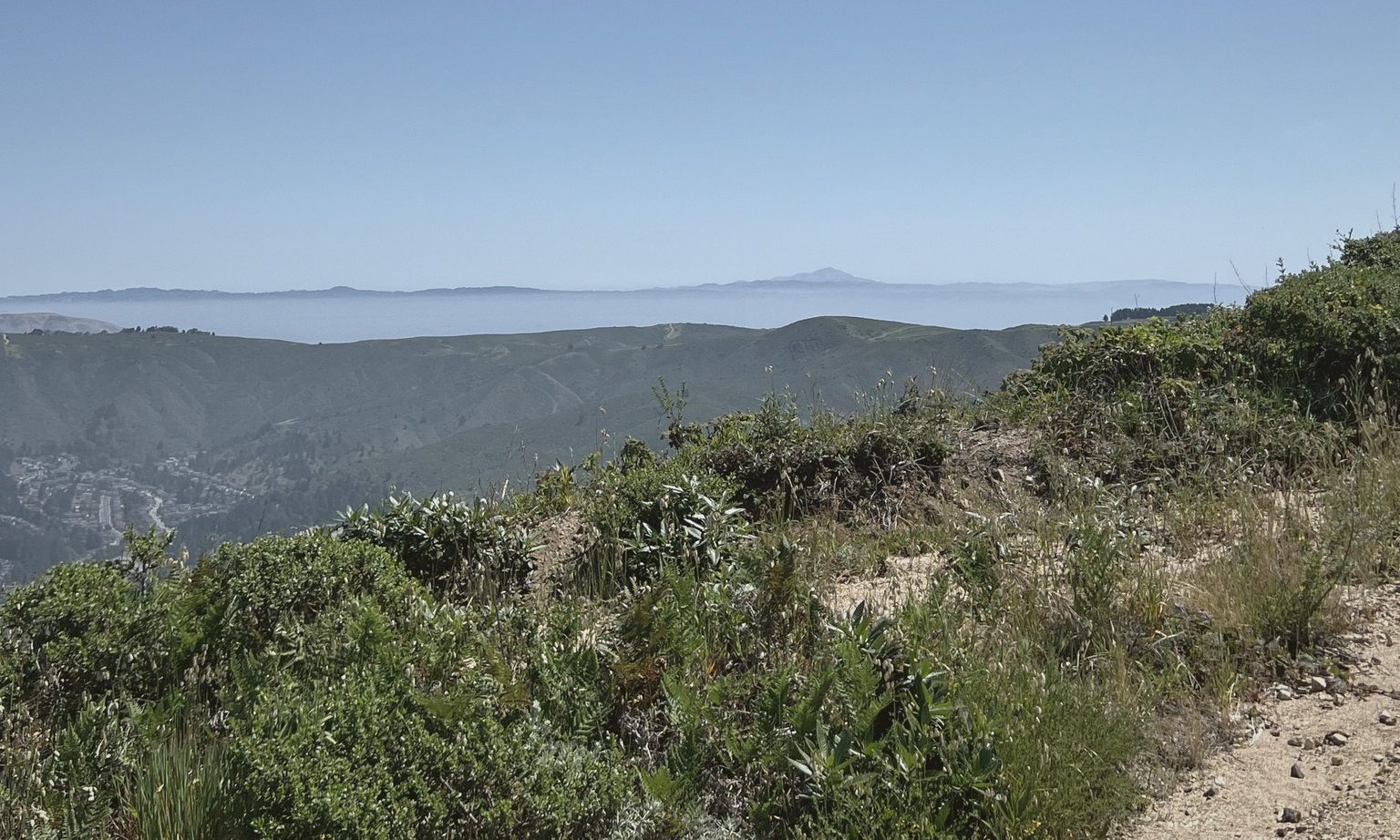 Ridges above the marine layer, the Pacific in the distance